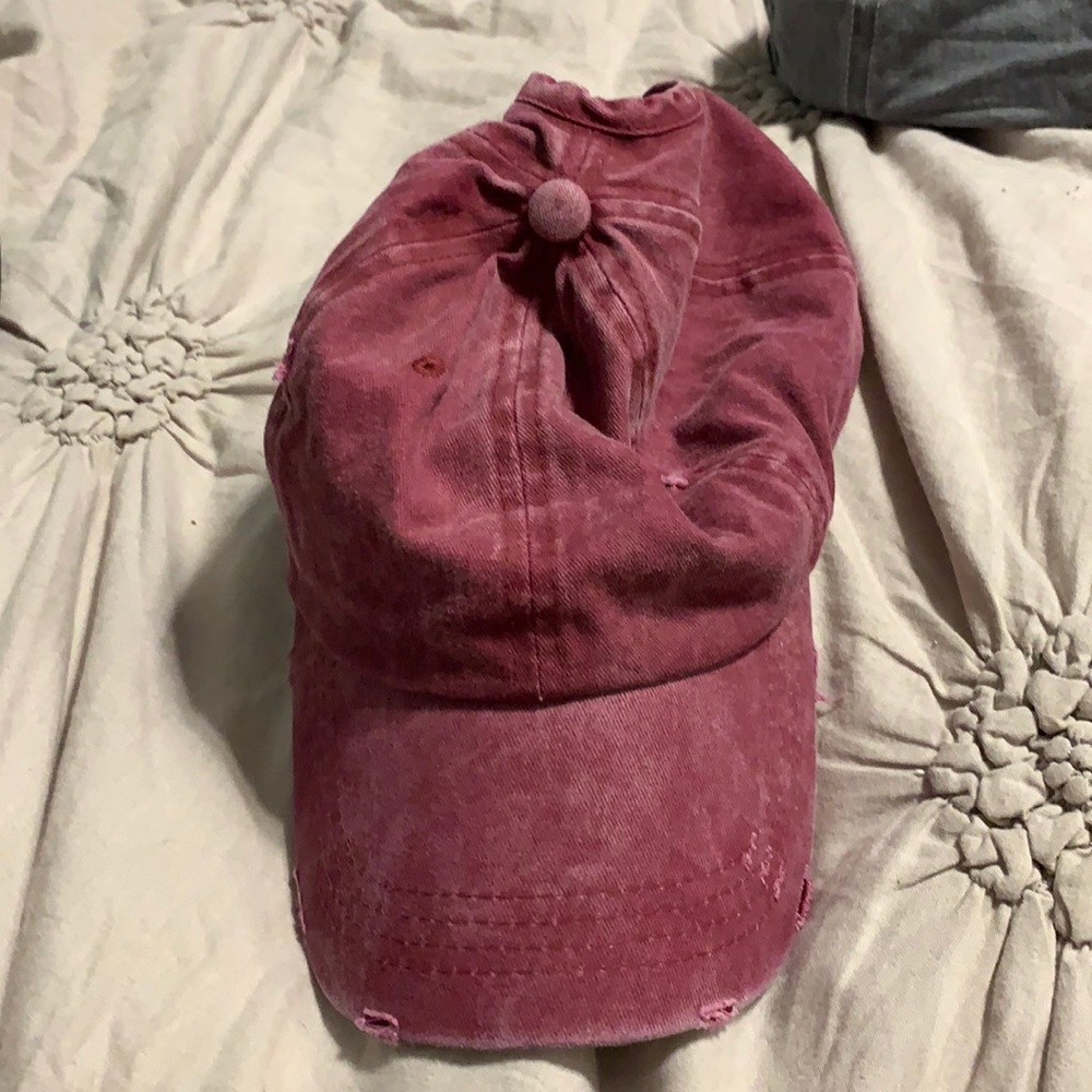 Women red hat with ponytail hole
